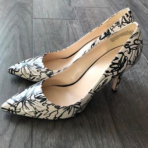 Black and cream pumps